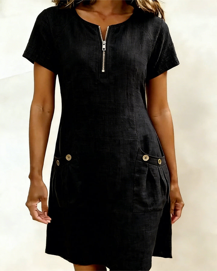 Black casual zip-pocket dress with short sleeves, half-zip, and side buttoned pockets