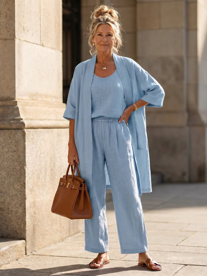 Blue lounge set with robe, tank, and wide-leg pants