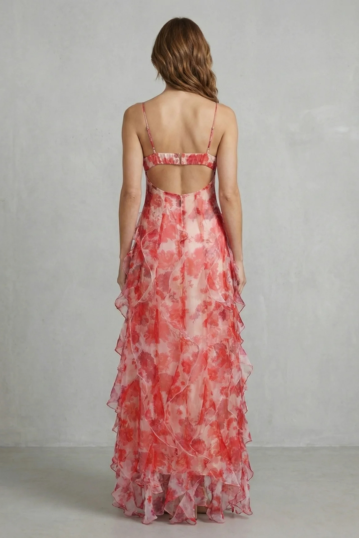 Back view of rose red floral chiffon maxi dress with ruffled tiers and thin straps