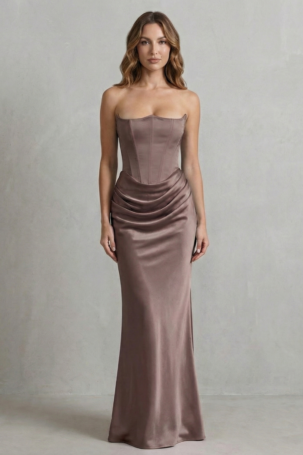 Taupe strapless corset maxi dress with gathered bodice and ruched skirt detail