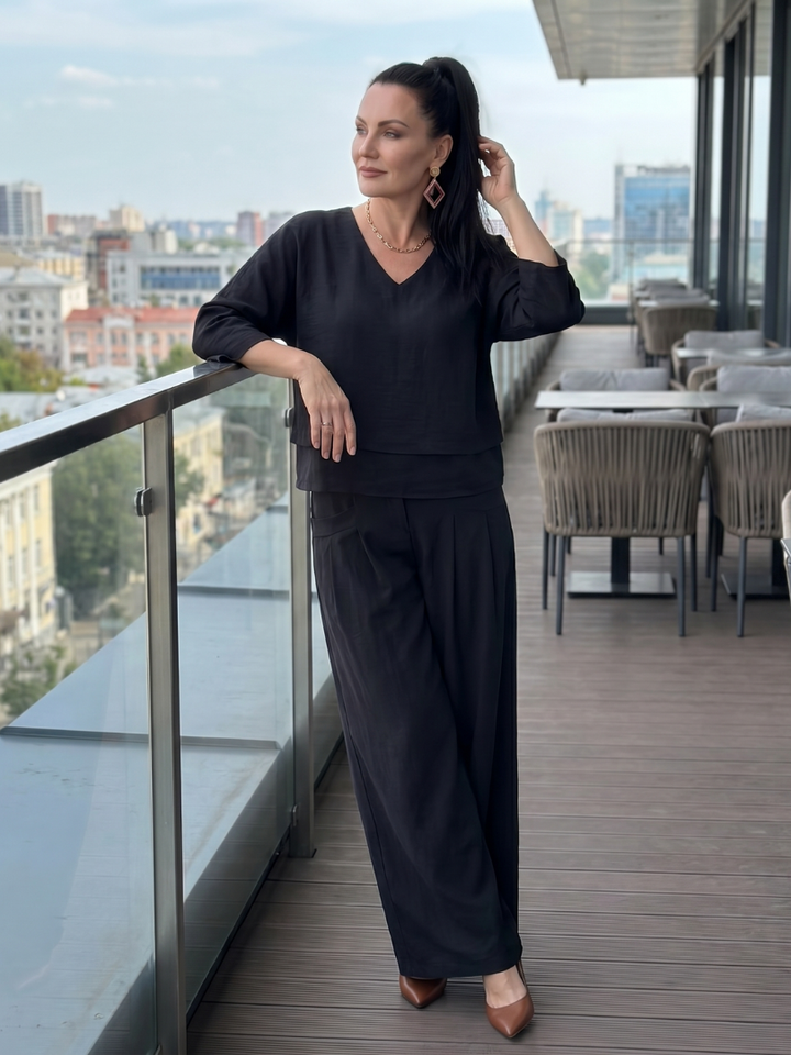 Black two-piece wide-leg pants set: V-neck top and wide-leg trousers