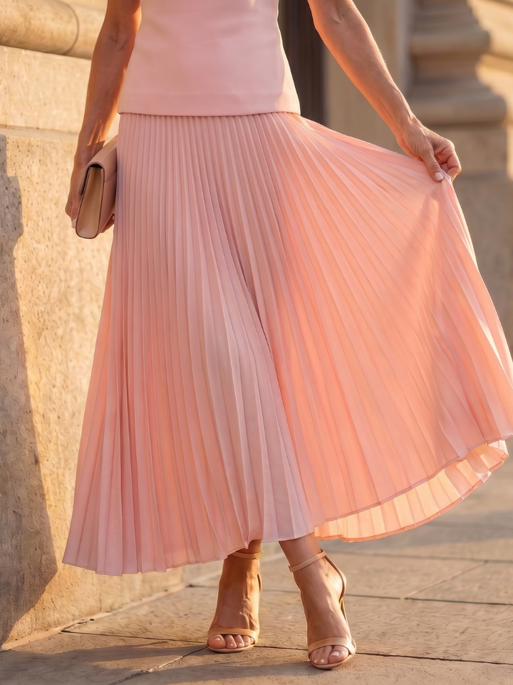 Sleeveless pleated two-piece set in pale pink