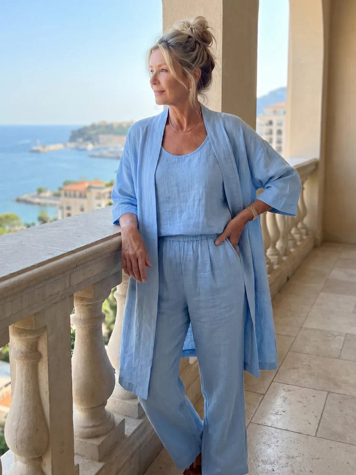 Blue lounge set with robe over tank and wide-leg pants