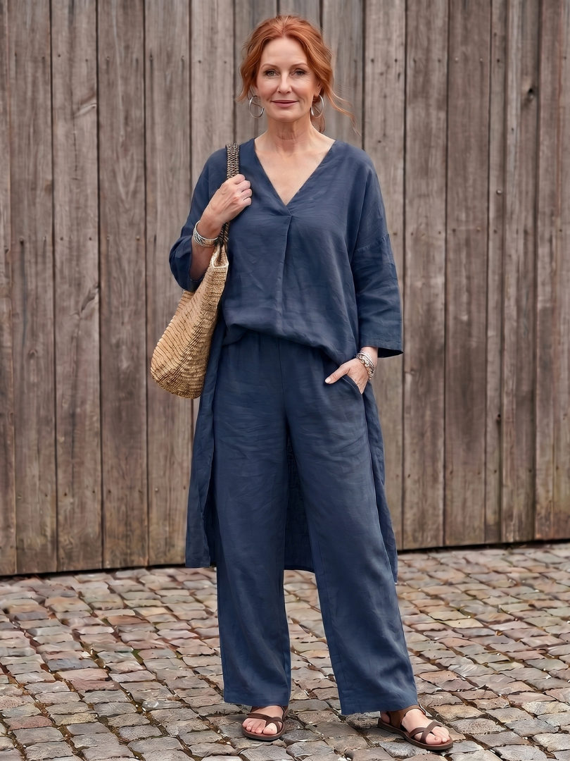 Blue linen two-piece set with V-neck blouse and wide-leg pants, 3/4 sleeves