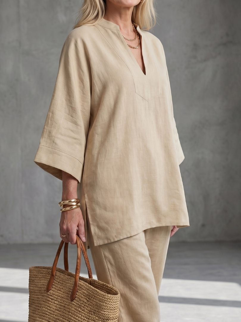 Women's beige two-piece set, v-neck tunic-style top with quarter sleeves and slim joggers