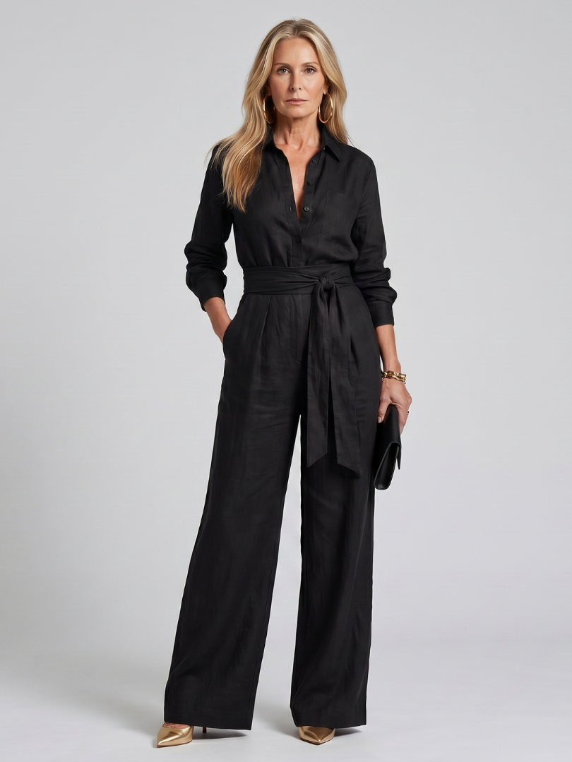 Black tie-waist jumpsuit with button-front, long sleeves and wide-leg pants