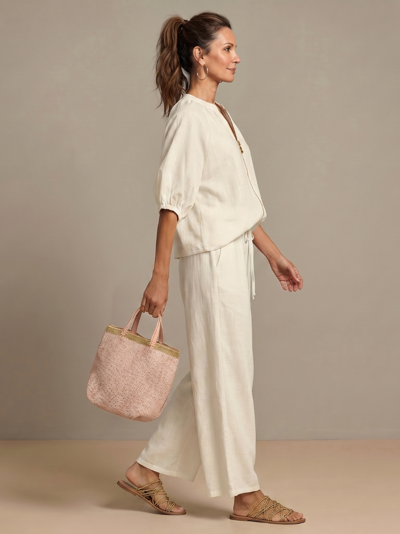 Women’s 2-piece pants set in white, short-sleeve puff top with zip, wide-leg pants