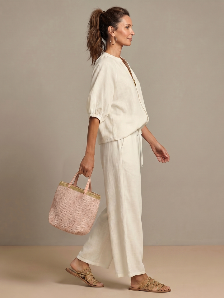 Women’s 2-piece pants set in white, short-sleeve puff top with zip, wide-leg pants