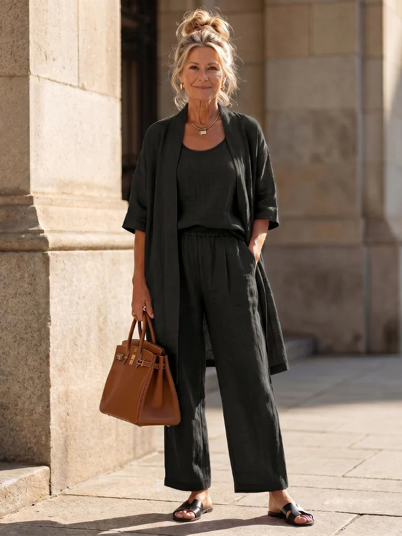 Black lounge set with robe over tank and wide-leg pants