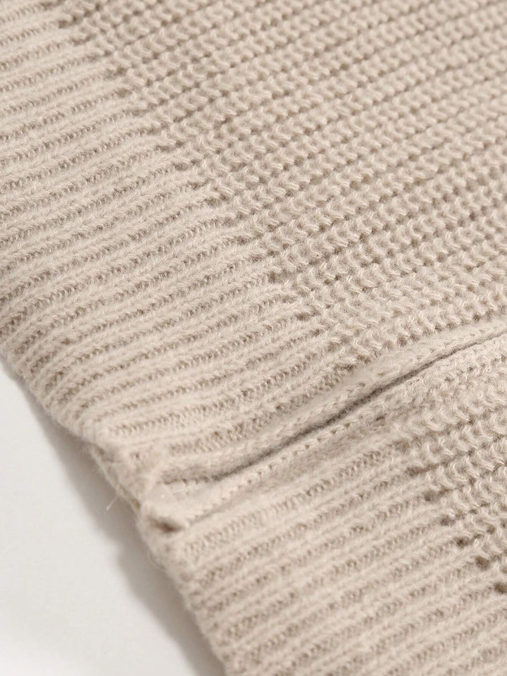 Beige ribbed knit cuff and hem edge on zip-up cardigan
