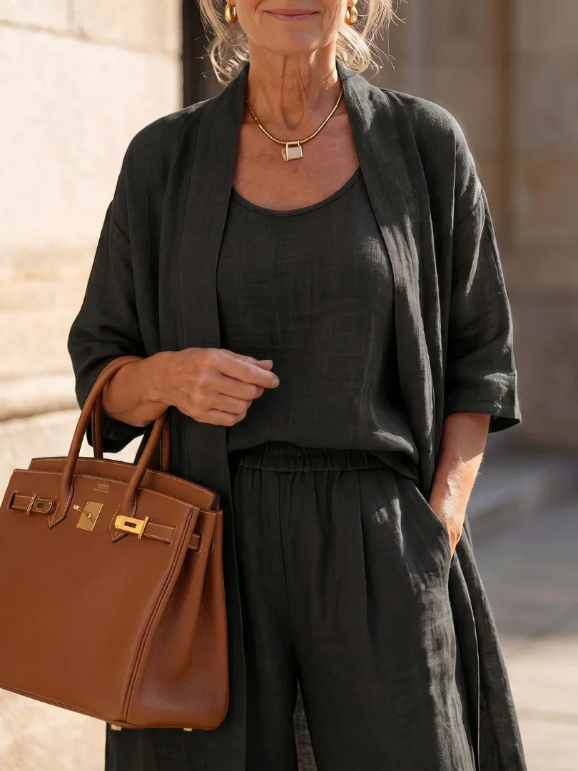 Black lounge set with robe and tank top detail, wide-leg pants