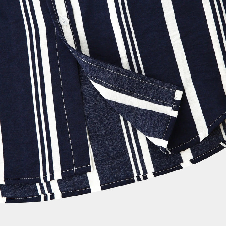 Navy blue striped shirt fabric detail with white vertical stripes and stitched edge