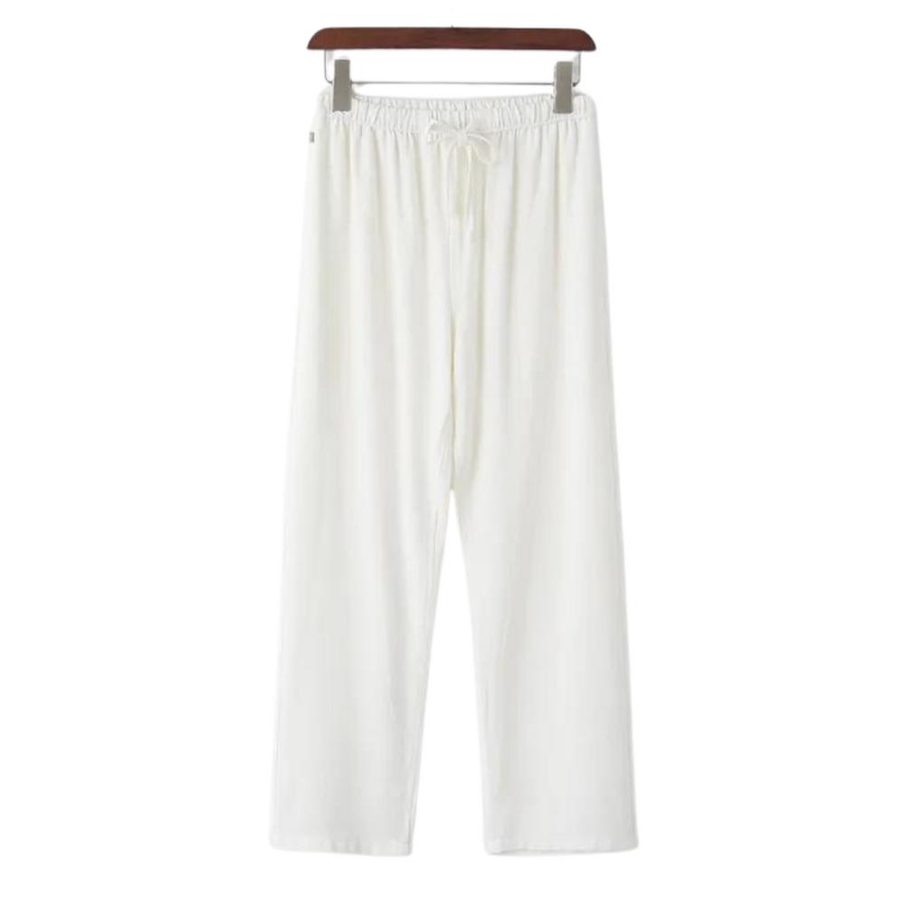 White linen pants with elastic waistband and tie drawstring, straight wide legs