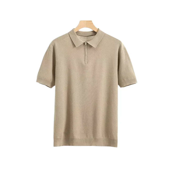 Beige zip polo shirt with short sleeves, polo collar, and front quarter zip
