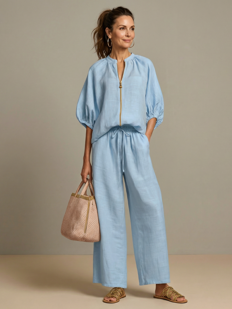 Light blue blouse and wide-leg pants set, zip-front, puff sleeves, drawstring waist