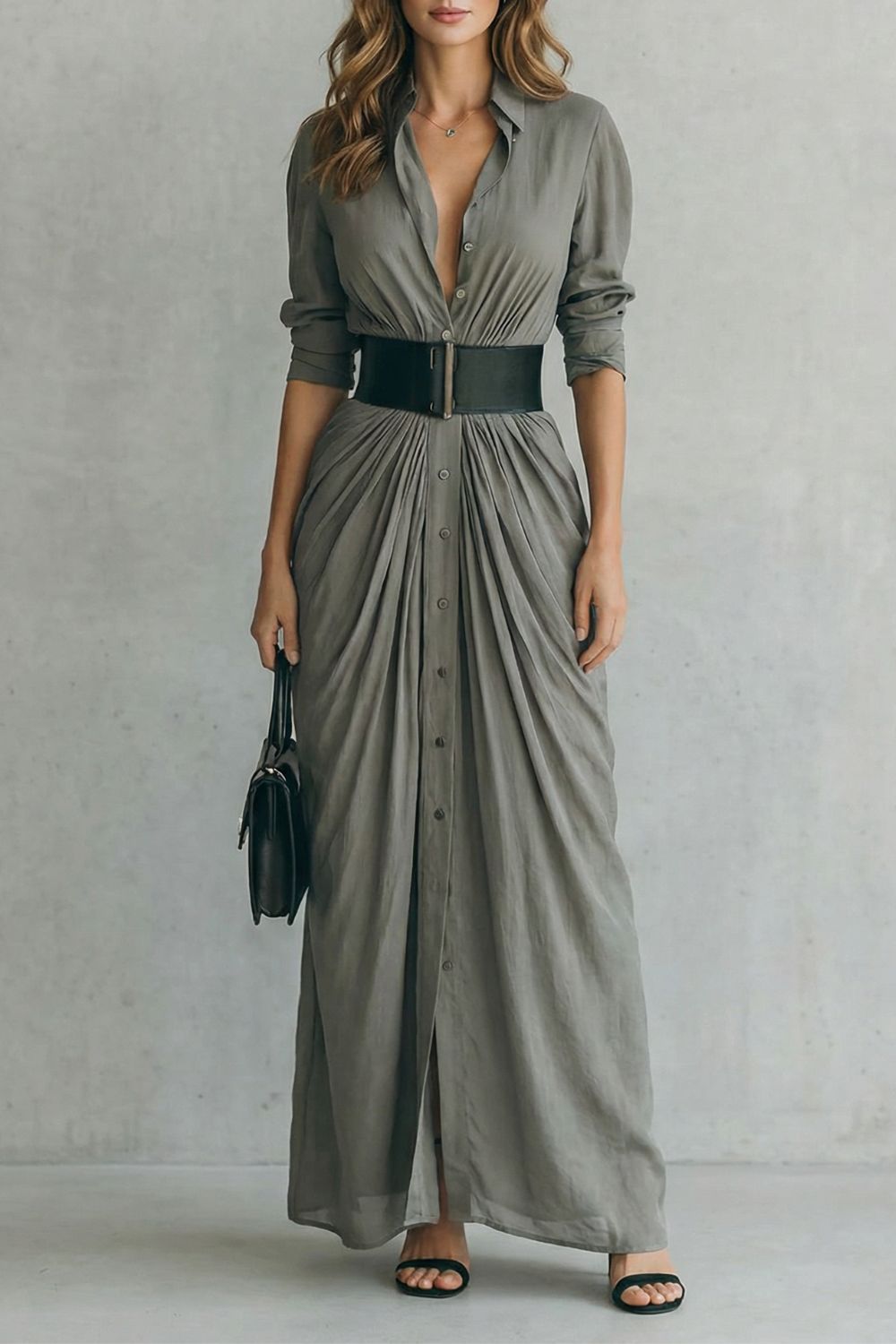 Gray shirt dress with V-neck, button front, belted waist, three-quarter sleeves.