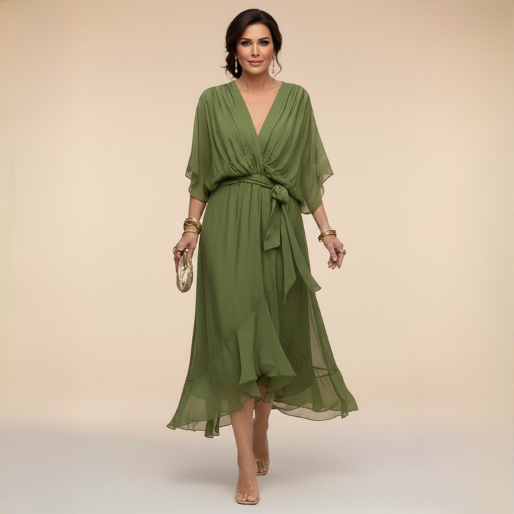 Green V-neck wrap dress with belt tie, loose fit, and airy chiffon finish