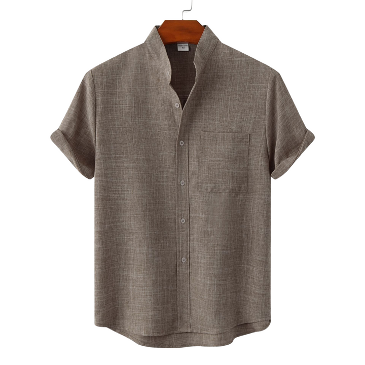Taupe solid cotton button-up shirt with short sleeves and front buttons.