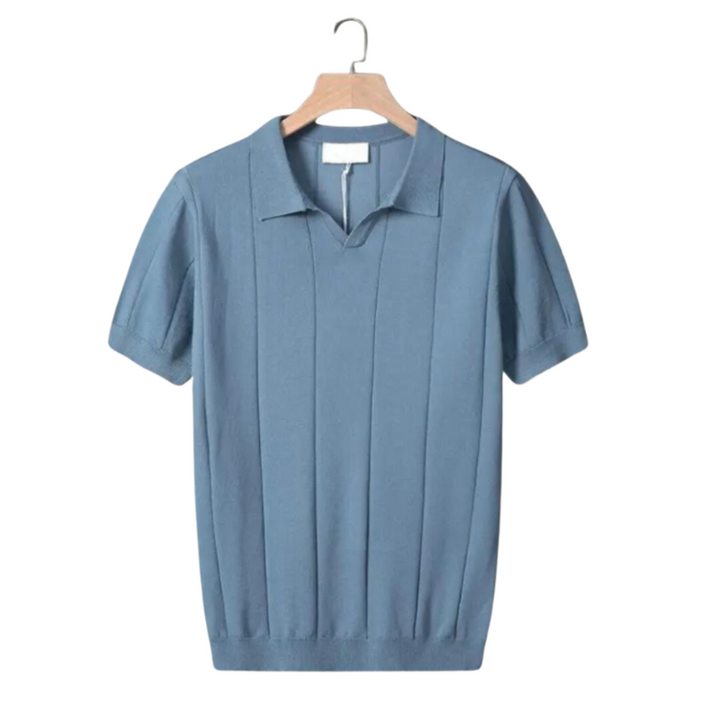 Blue cotton polo shirt on hanger with ribbed vertical knit texture and knit collar