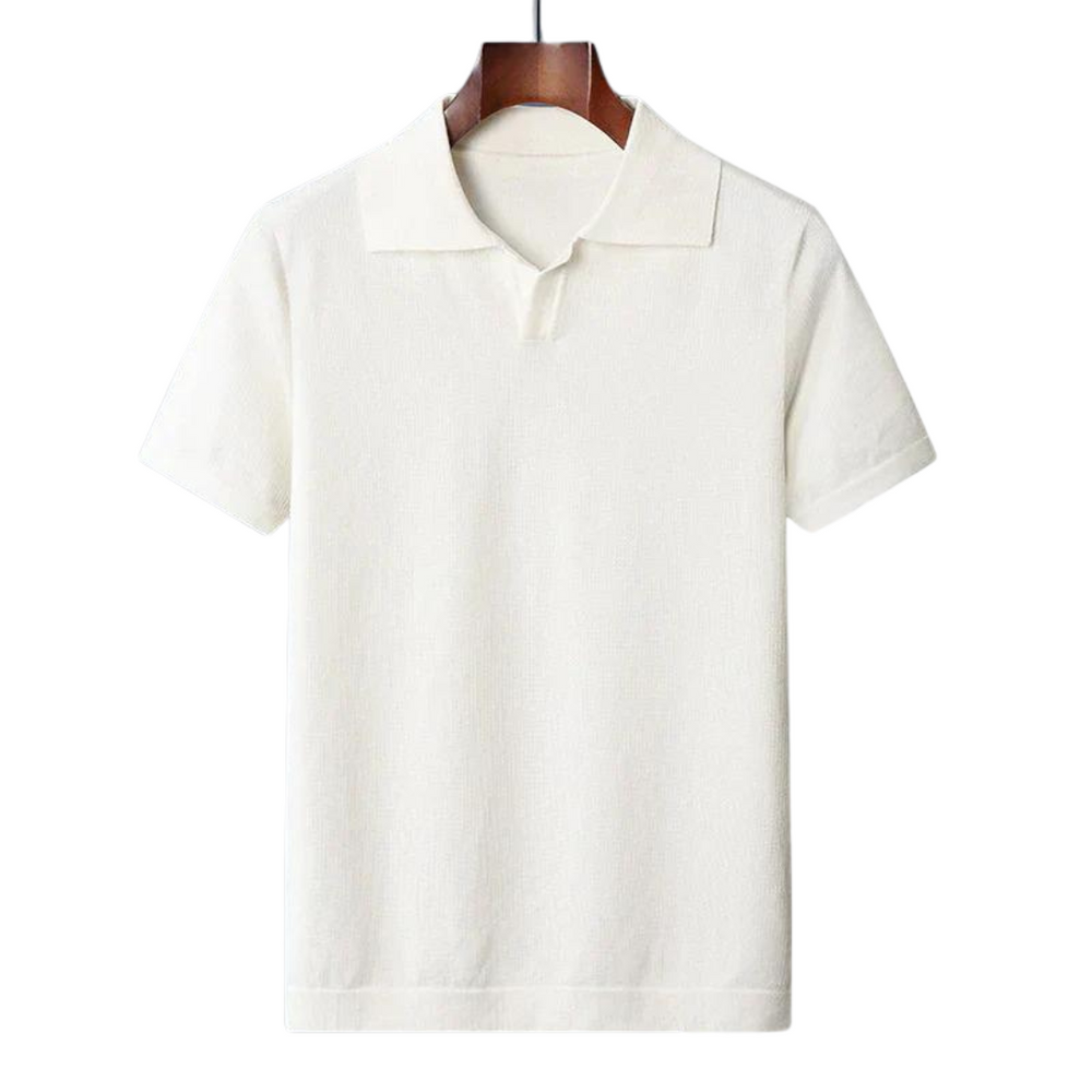 White classic cotton polo shirt with short sleeves and flat, fold-over collar