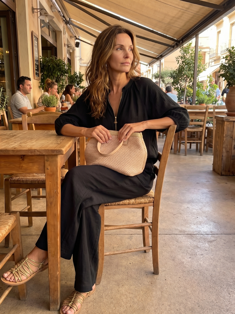 Women’s wide-leg pants set: black blouse with elastic cuffs and matching wide-leg trousers