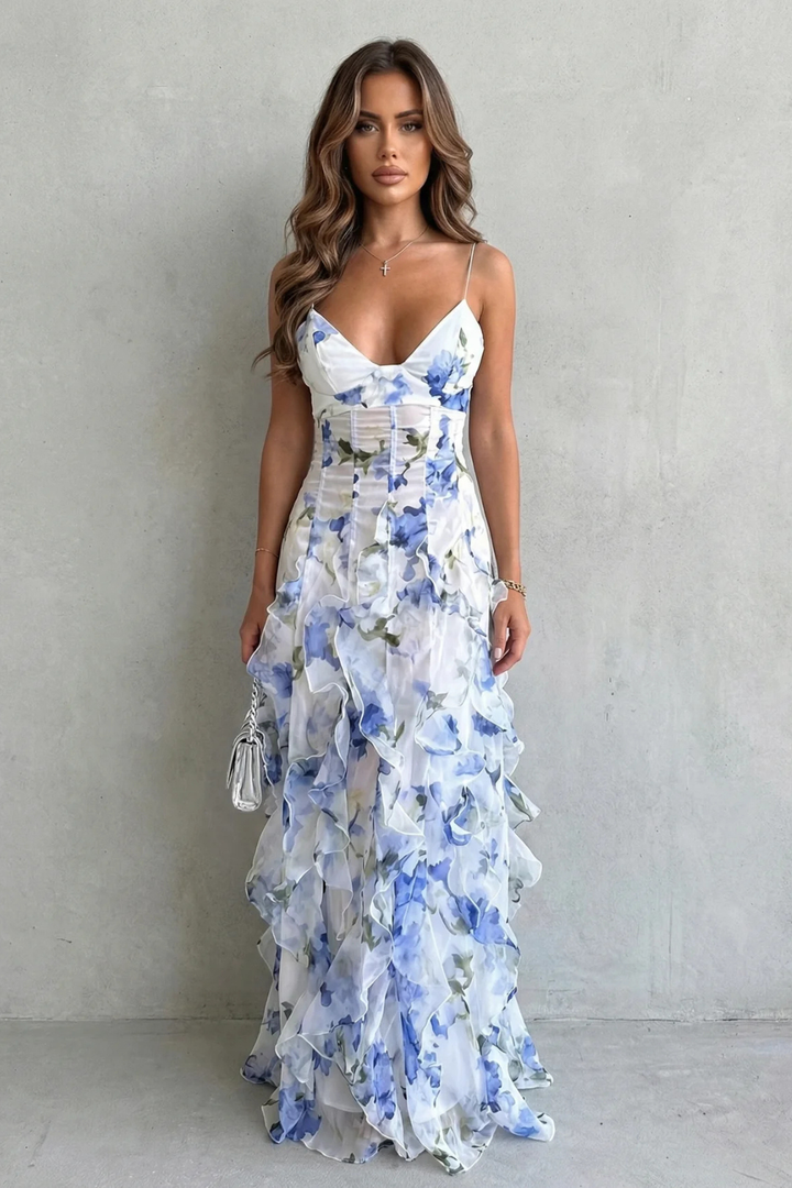 Light blue floral chiffon maxi dress with ruffled tiers and thin spaghetti straps
