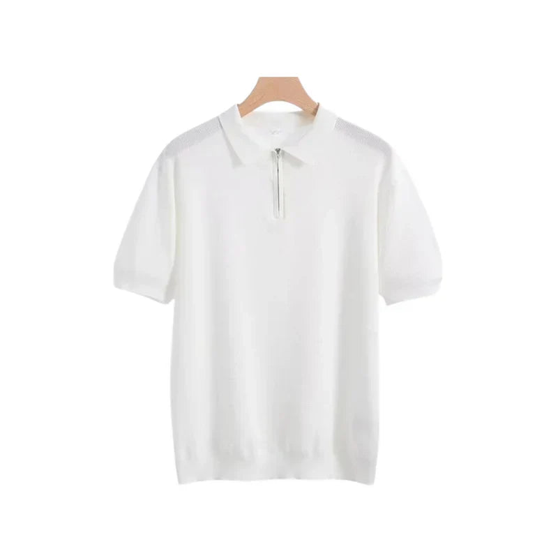 White zip polo shirt with short sleeves, polo collar, and front quarter zip
