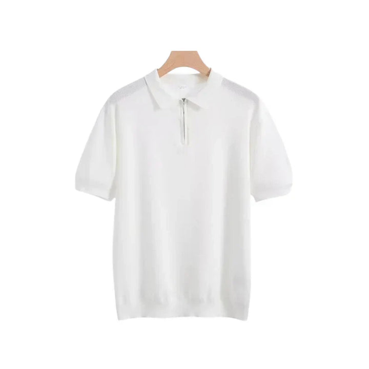 White zip polo shirt with short sleeves, polo collar, and front quarter zip