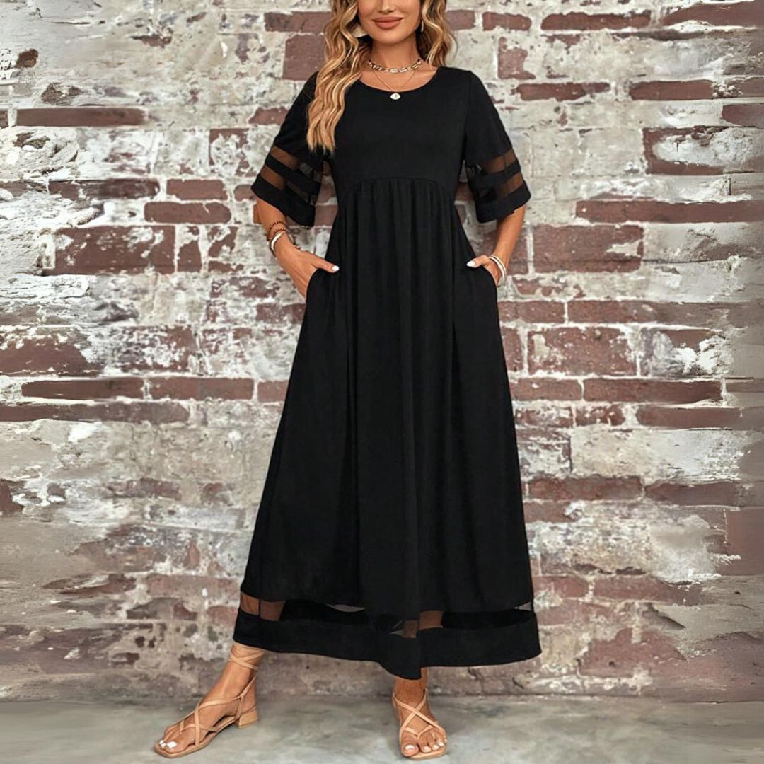 Black midi dress with scoop neck, gathered waist, sheer cutout sleeves, and mesh hem.