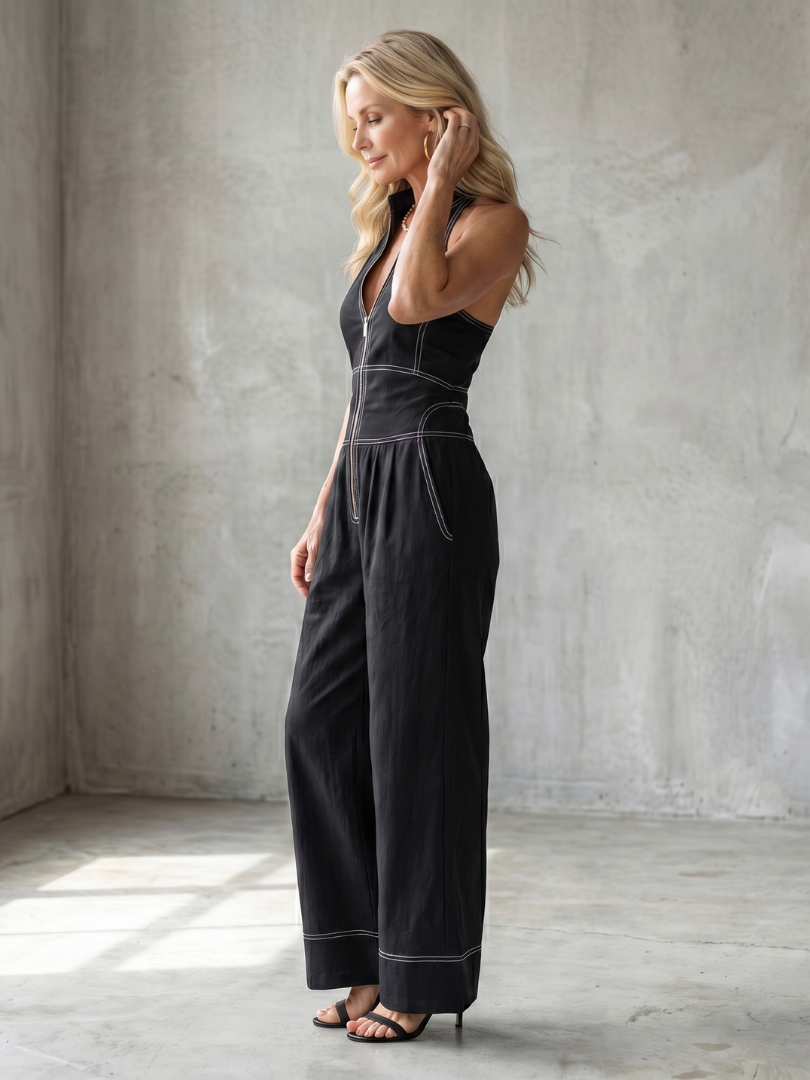 Women’s zip-front jumpsuit, black sleeveless with V-neck and wide-leg trouser fit