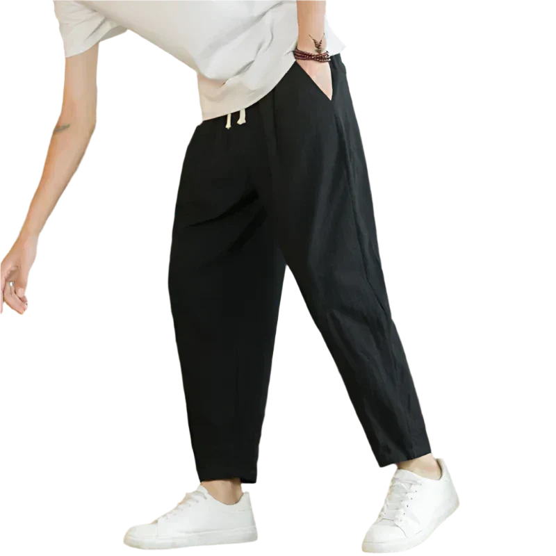 Black cotton pants with drawstring waist, relaxed tapered leg, ankle length