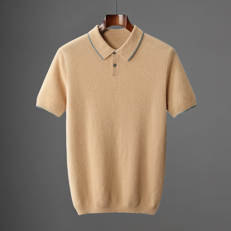 Beige knit polo shirt with blue-trimmed collar and button placket