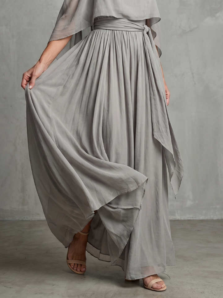 Gray pleated maxi skirt with flowing overlay, adjustable gathered waist