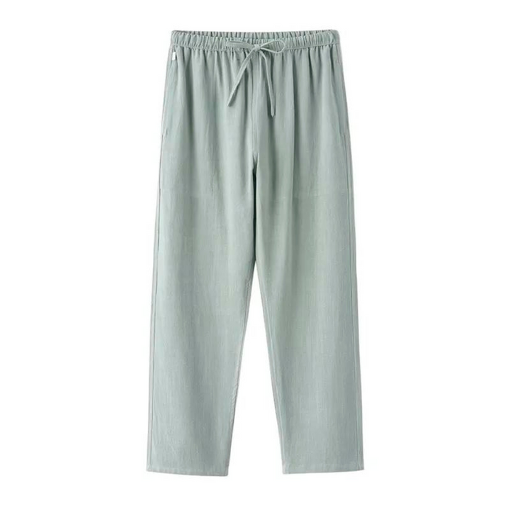 Light green linen pants with elastic waistband and tie drawstring, relaxed straight legs