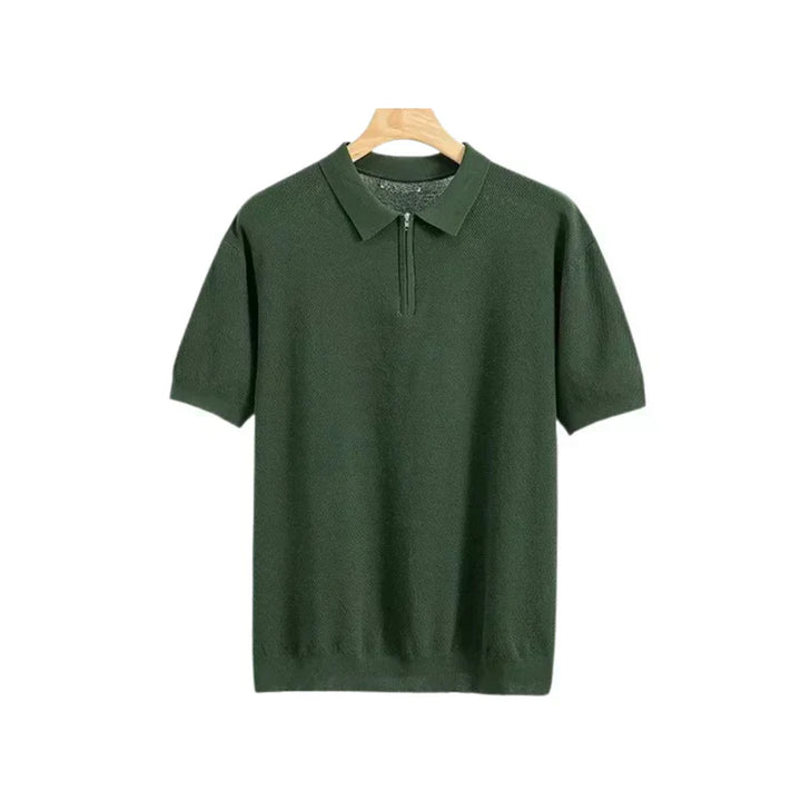 Dark green zip polo shirt with short sleeves, polo collar, and front quarter zip