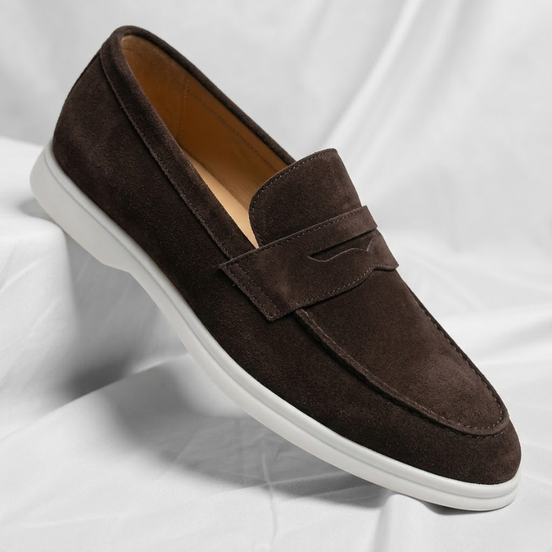 Brown suede loafers with strap and stitched seam, white rubber sole