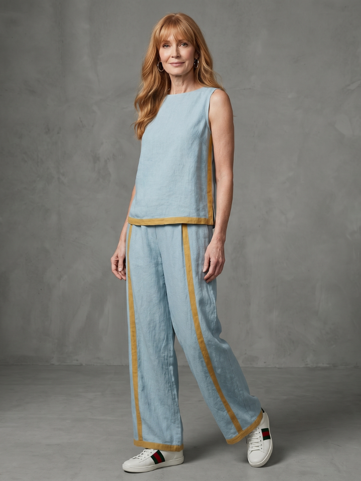 Sky blue linen sleeveless top and wide-leg pants with tan contrast piping