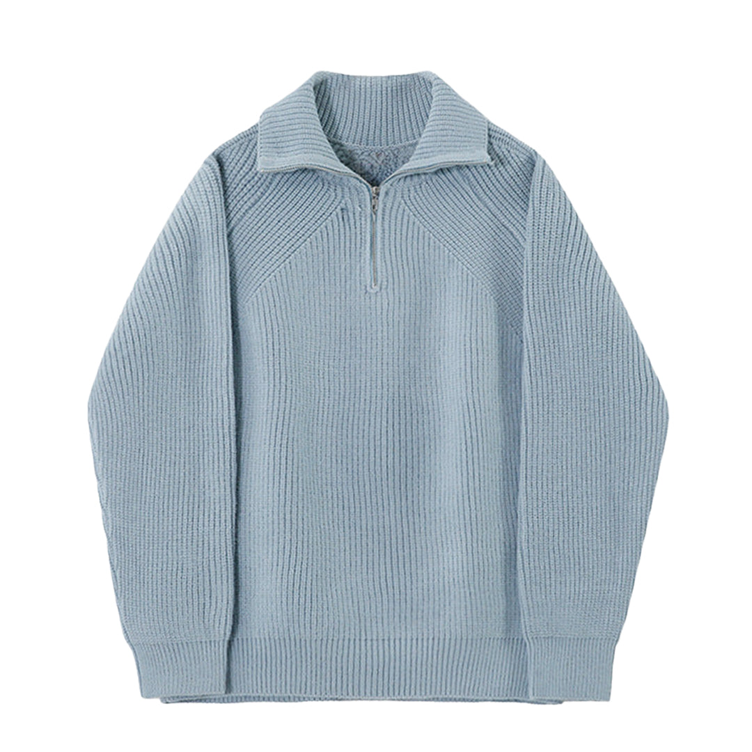 Light blue quarter-zip knit pullover sweater with ribbed stand collar and cuffs.