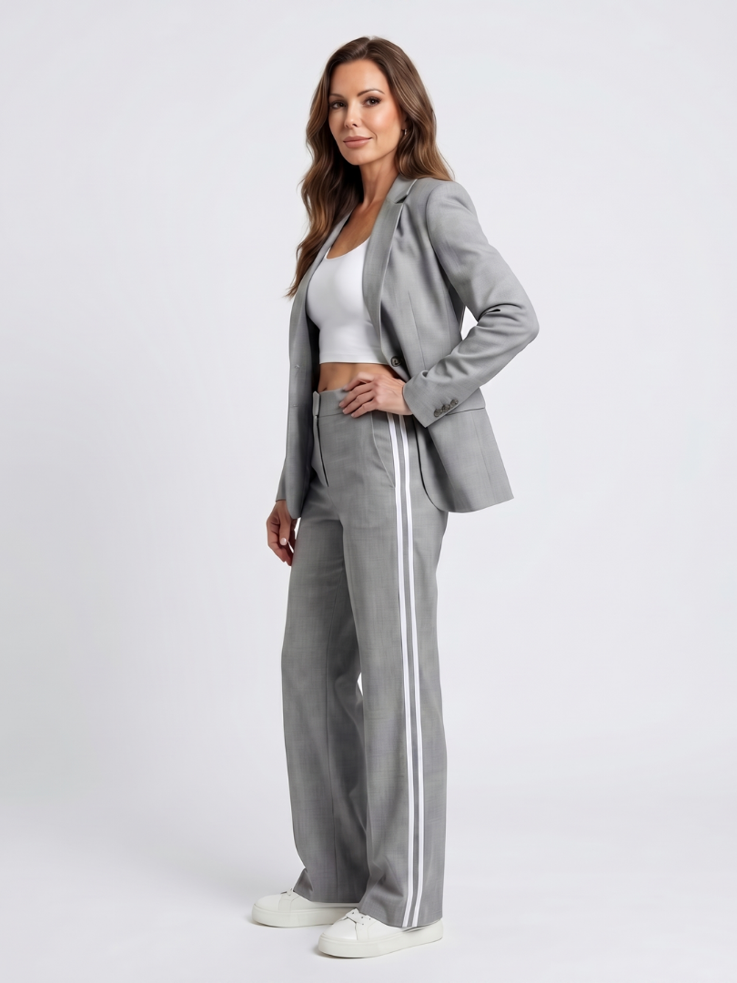 Gray women's blazer set, side view: blazer and wide-leg pants with white stripe