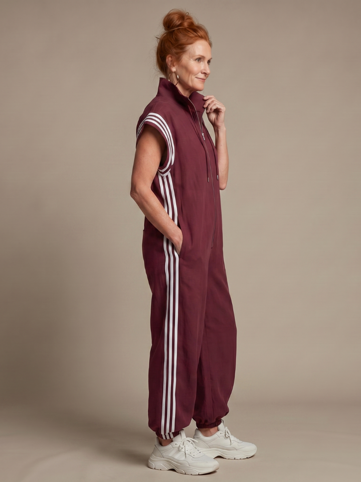 Women’s sleeveless zip-front jumpsuit, maroon with white striped sleeves and leg side stripes