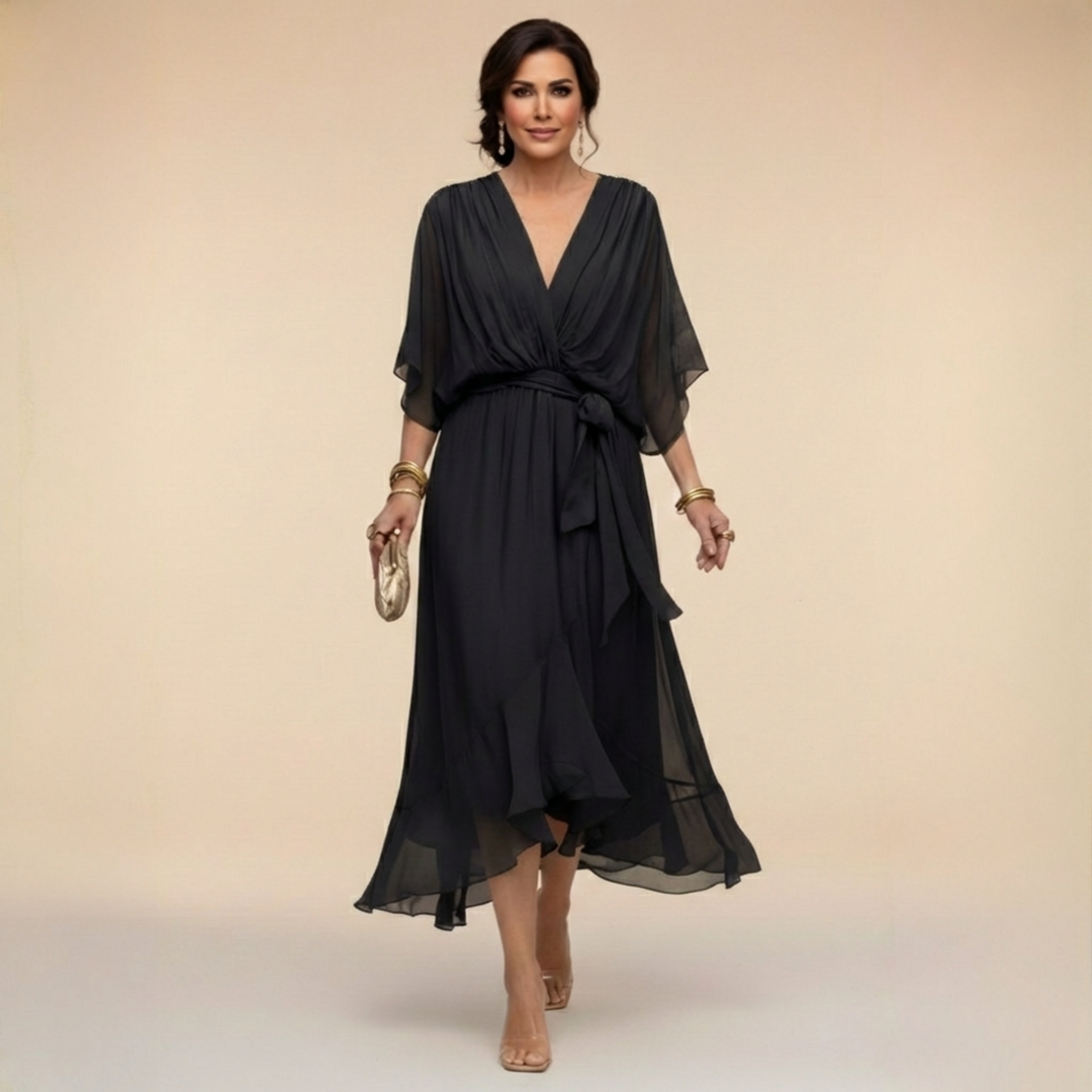 Black V-neck wrap dress with tied waist and flowing chiffon midi length