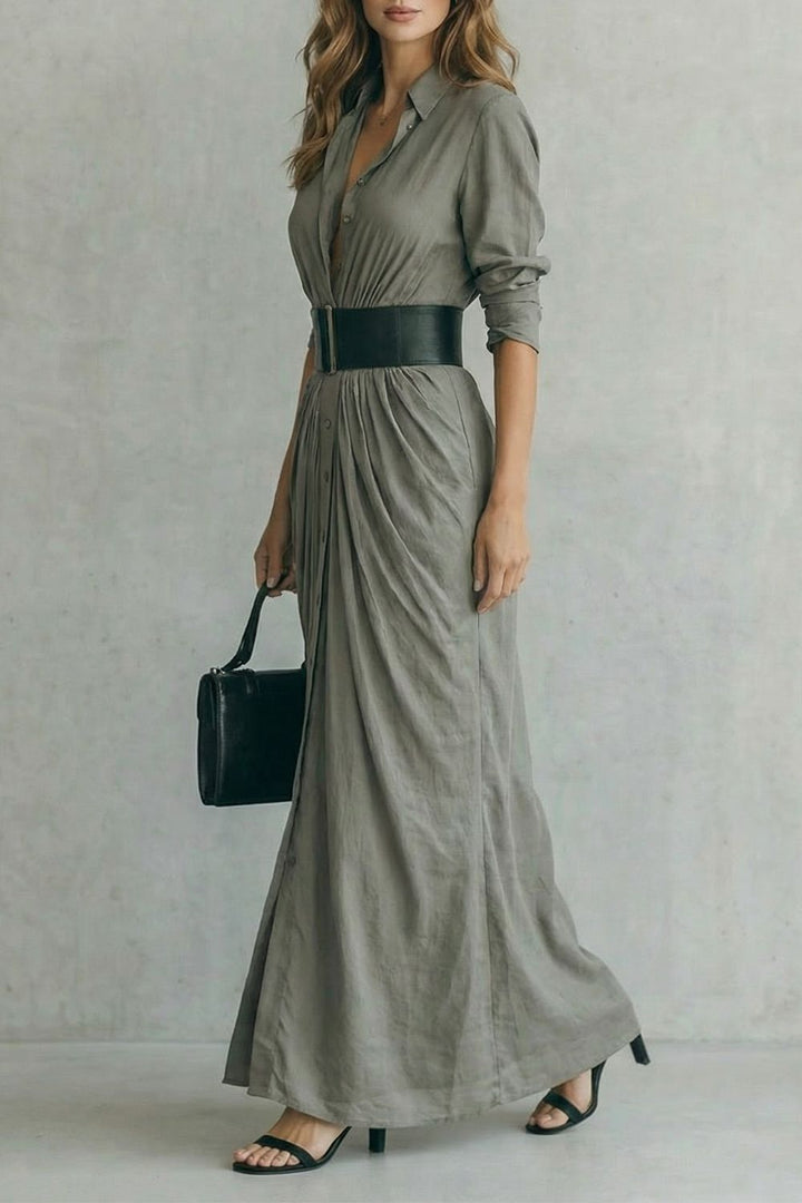 Olive shirt dress with V-neck, button front, belted waist, flowing maxi length.