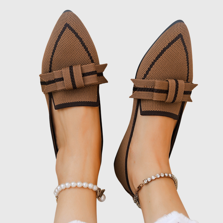 Brown pointed toe bow flats with striped bow and curved strap detail