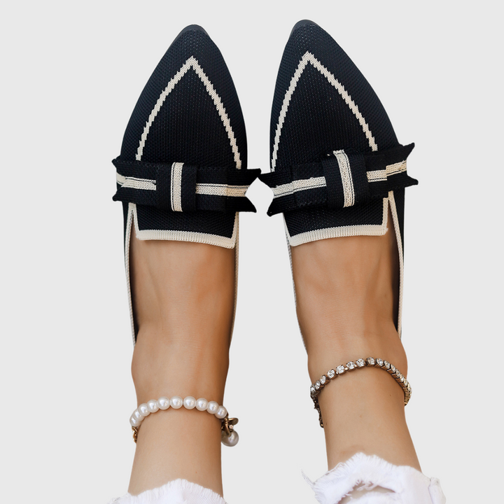 Black pointed toe bow flats with striped grosgrain ribbon detail