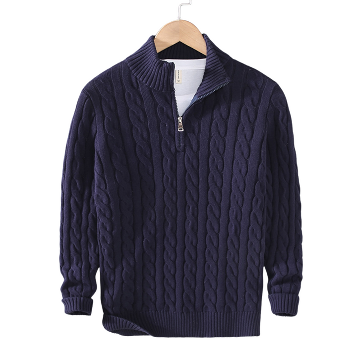 Navy cable-knit half-zip pullover with raised cable pattern and ribbed trim