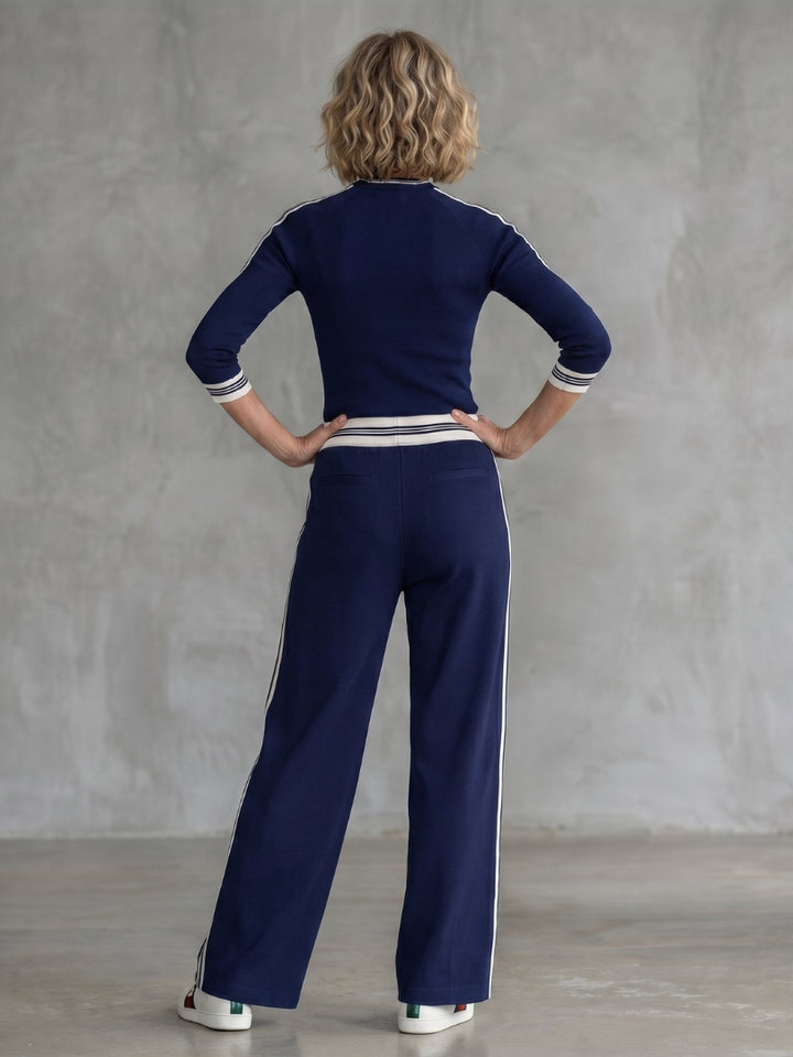Navy stripe lounge set with mock neck top and wide-leg joggers, back view