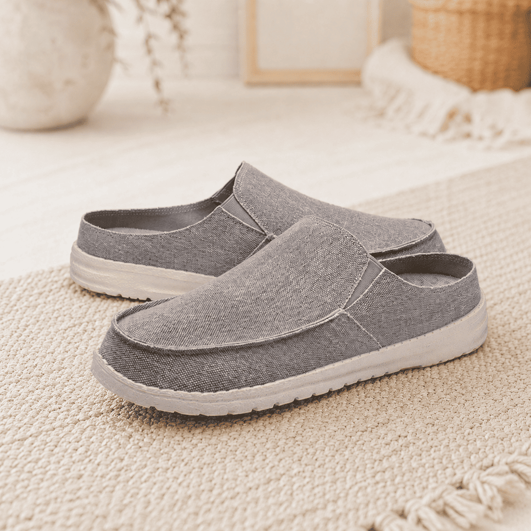 Slip-on shoes in medium gray textured fabric with cushioned white rubber sole