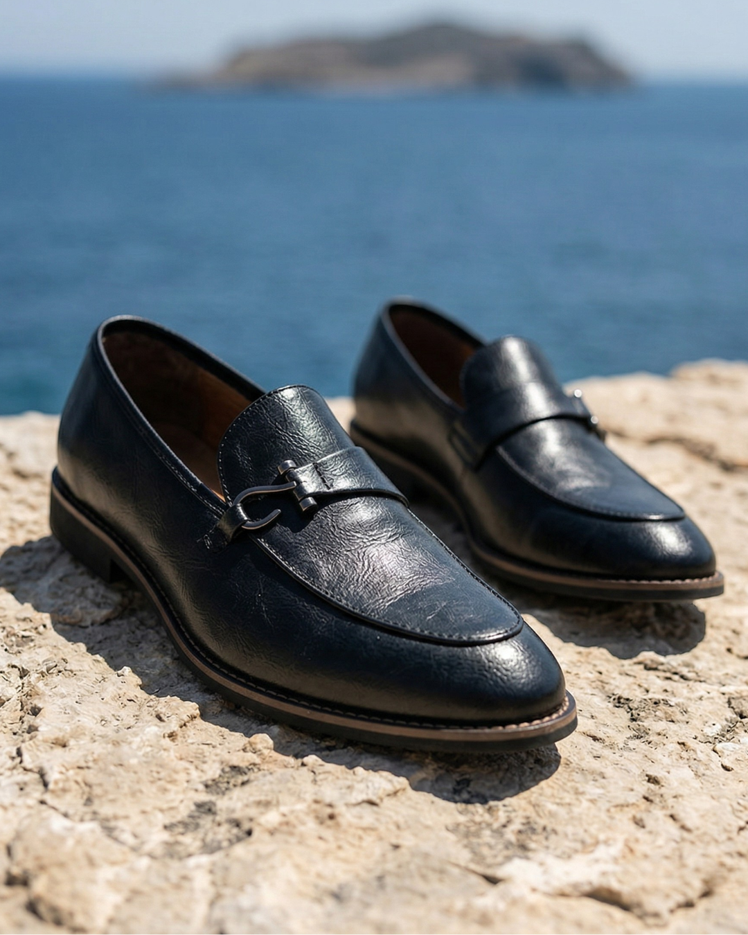 Black leather nautical loafer with metal bit detail and moc toe stitching
