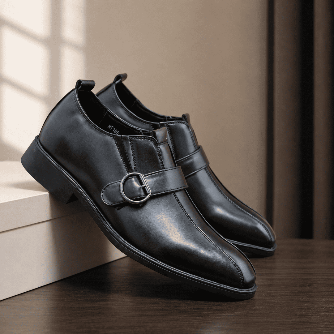 Black leather formal monk-strap shoes with single buckle and sleek toe
