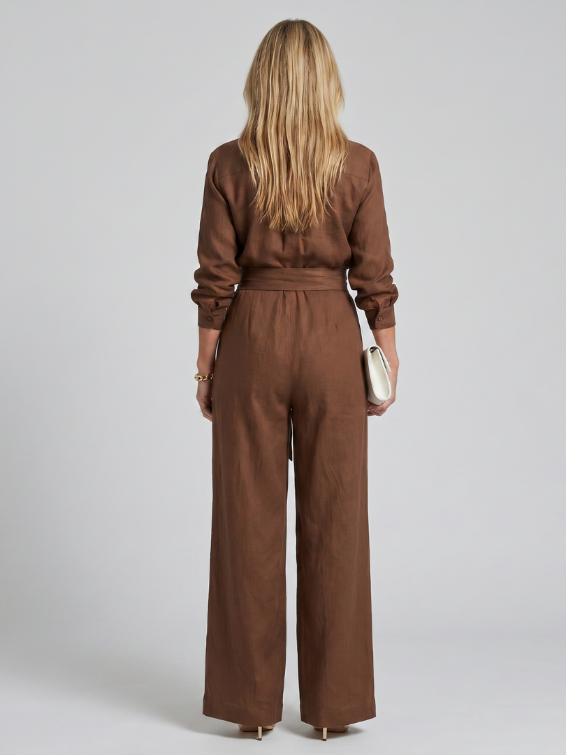 Brown tie-waist jumpsuit, back view with long sleeves and wide legs